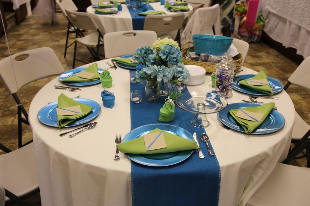 image of elegant silver-blue and green themed table setting