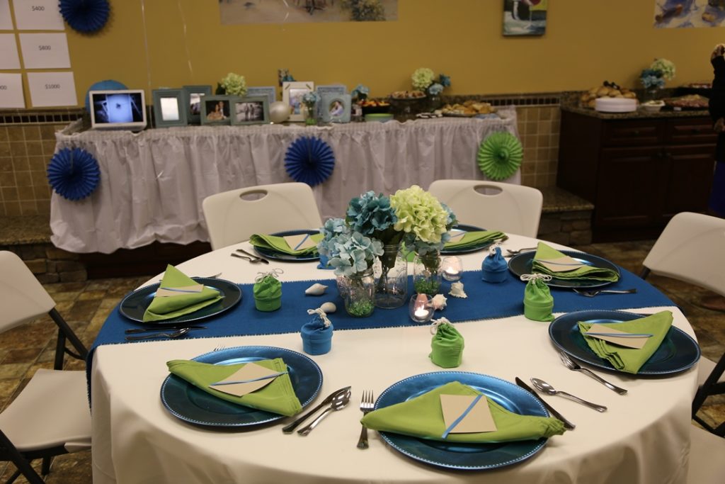 image of beautiful silver-blue and green table setting at Your Own Winery Bridal Shower