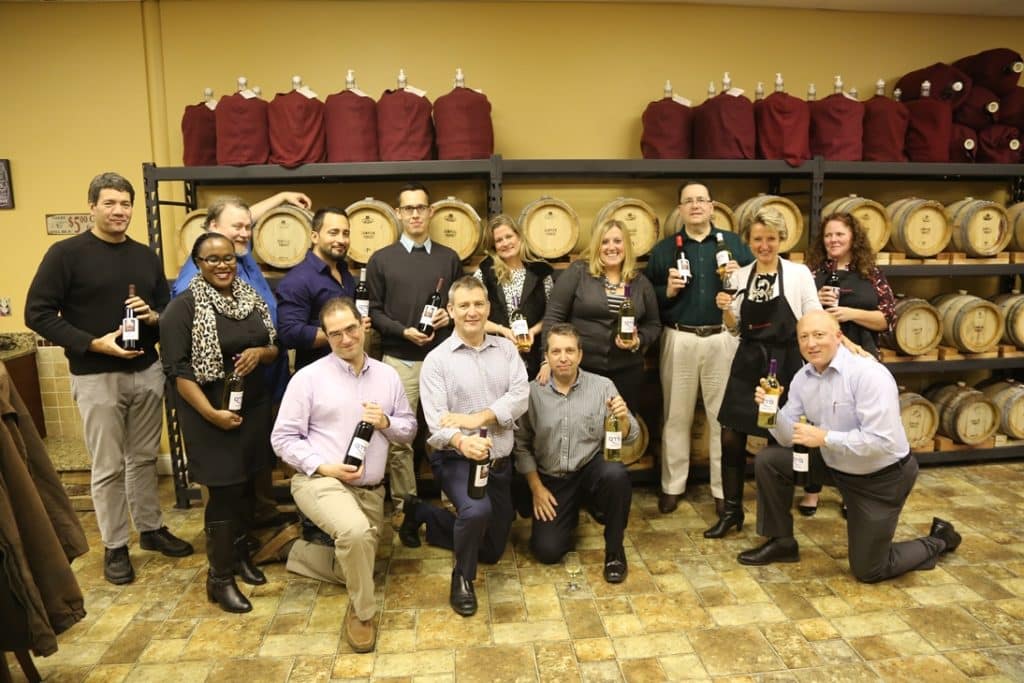 image of team building wine-making at your own winery