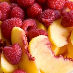 image of raspberries and peaches for fruit flavored wines from your own winery